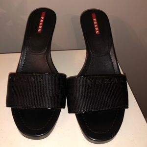 Prada black leather wedges